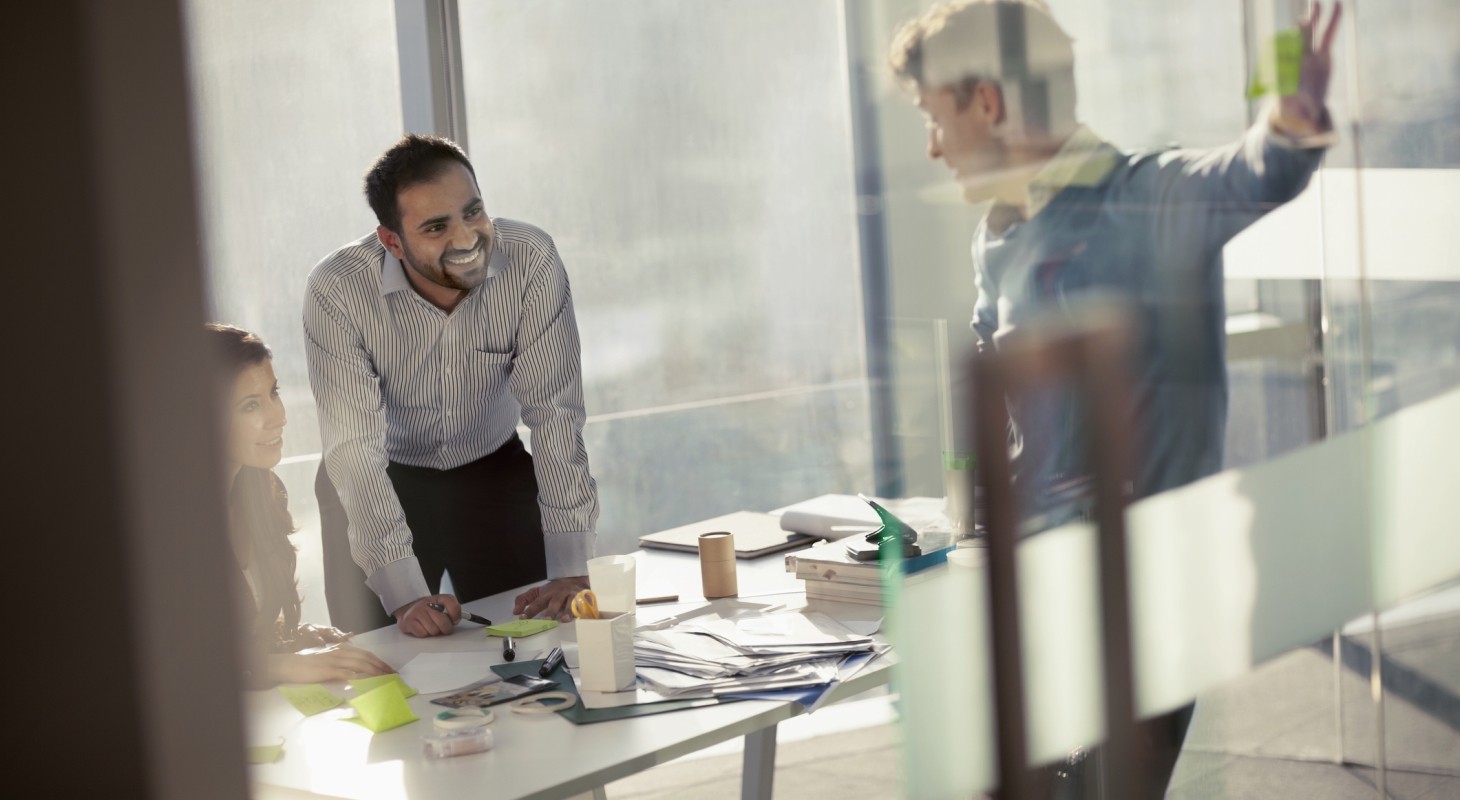 business colleagues smiling in planning meeting