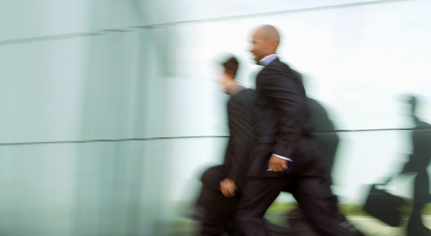 businessmen running