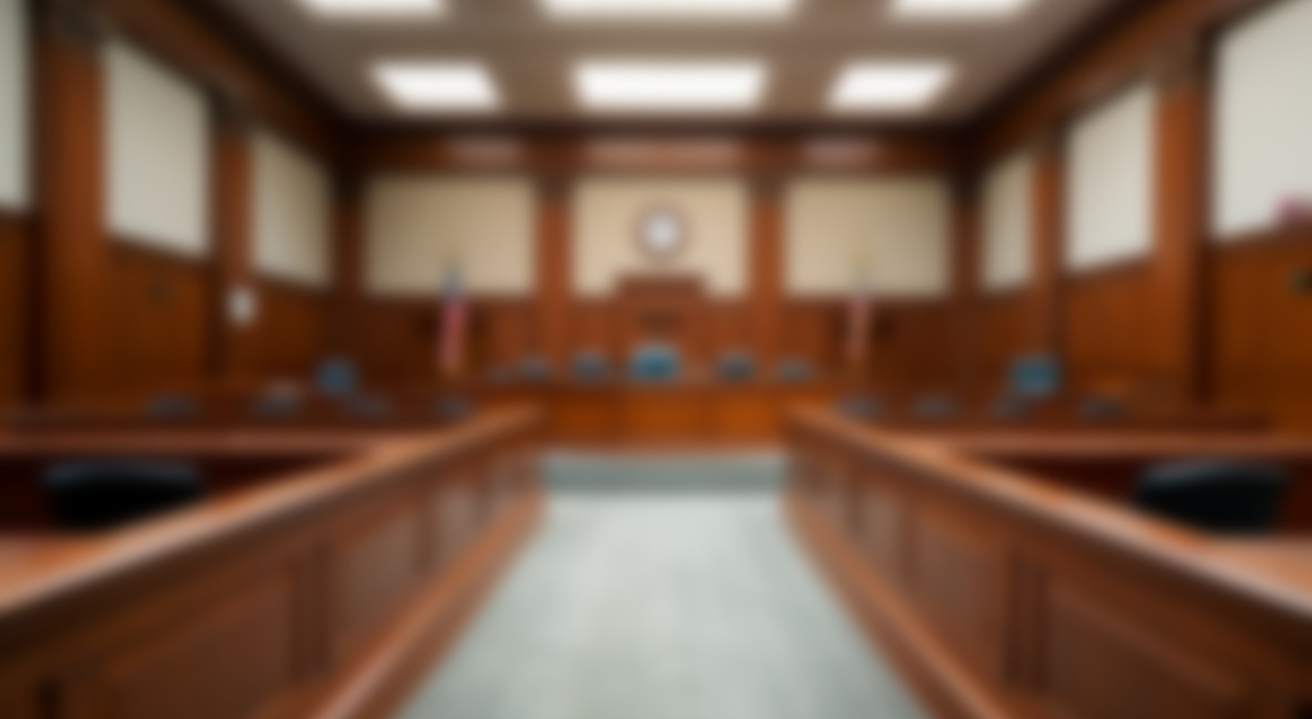 blurred background of an empty courtroom