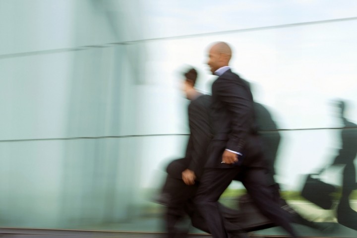 businessmen running