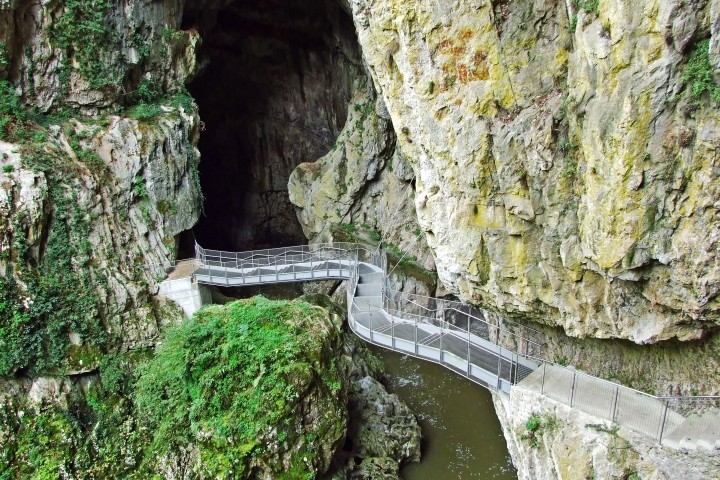 mountain chasm connected by foot bridge