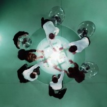 overhead-view-of-business-people-analyzing-map